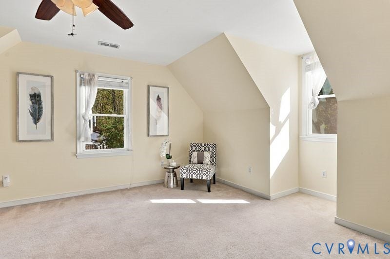 10208 Claybar Trail, Chesterfield, VA 23236 Neutral wall tones, vaulted ceilings, carpeting, and multiple windows
