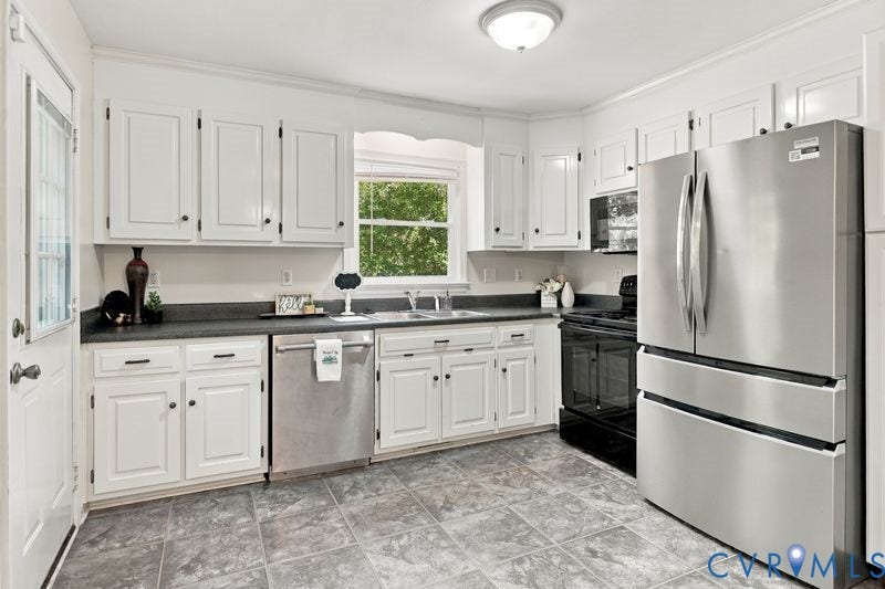 10208 Claybar Trail, Chesterfield, VA 23236 Kitchen featuring white cabinetry, solid-surface countertops, stainless steel dishwasher and refrigerator, black range, and tile flooring