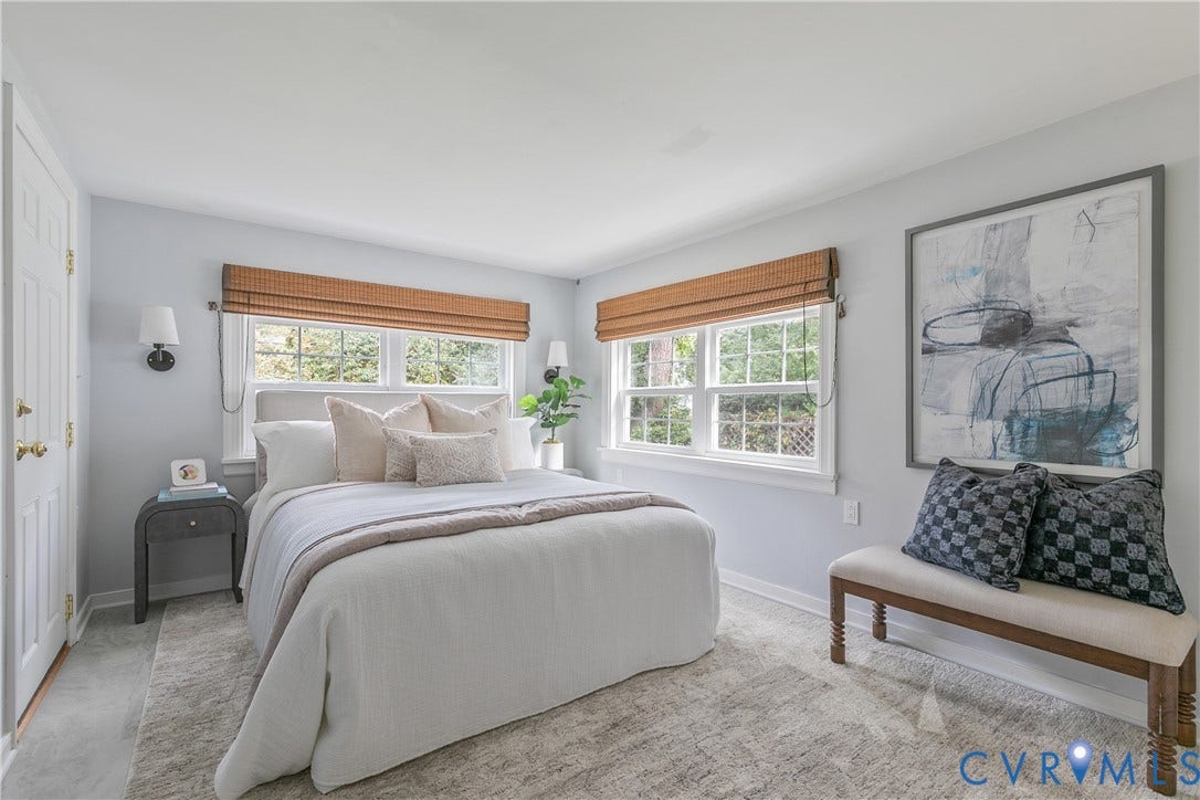 4710 Park Avenue, Mary Munford / Near West End, Richmond, VA 23226 Neutral-toned interior featuring dual windows with woven wood shades and wall-mounted light fixtures