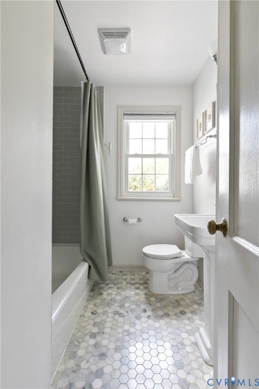 4710 Park Avenue, Mary Munford / Near West End, Richmond, VA 23226 Full bathroom featuring hexagonal mosaic tile flooring, a pedestal sink, a bathtub with a tiled surround, and a double-hung window