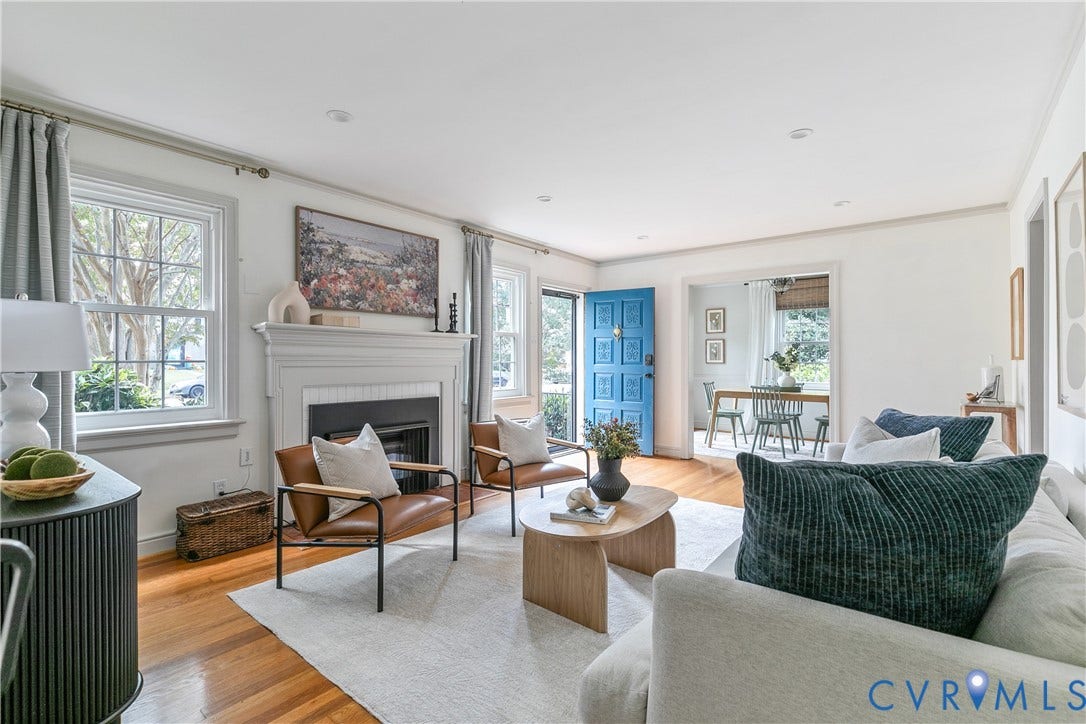 4710 Park Avenue, Mary Munford / Near West End, Richmond, VA 23226 Living room featuring wood-finish flooring, a traditional fireplace with a white mantel, recessed lighting, and a paneled blue entry door