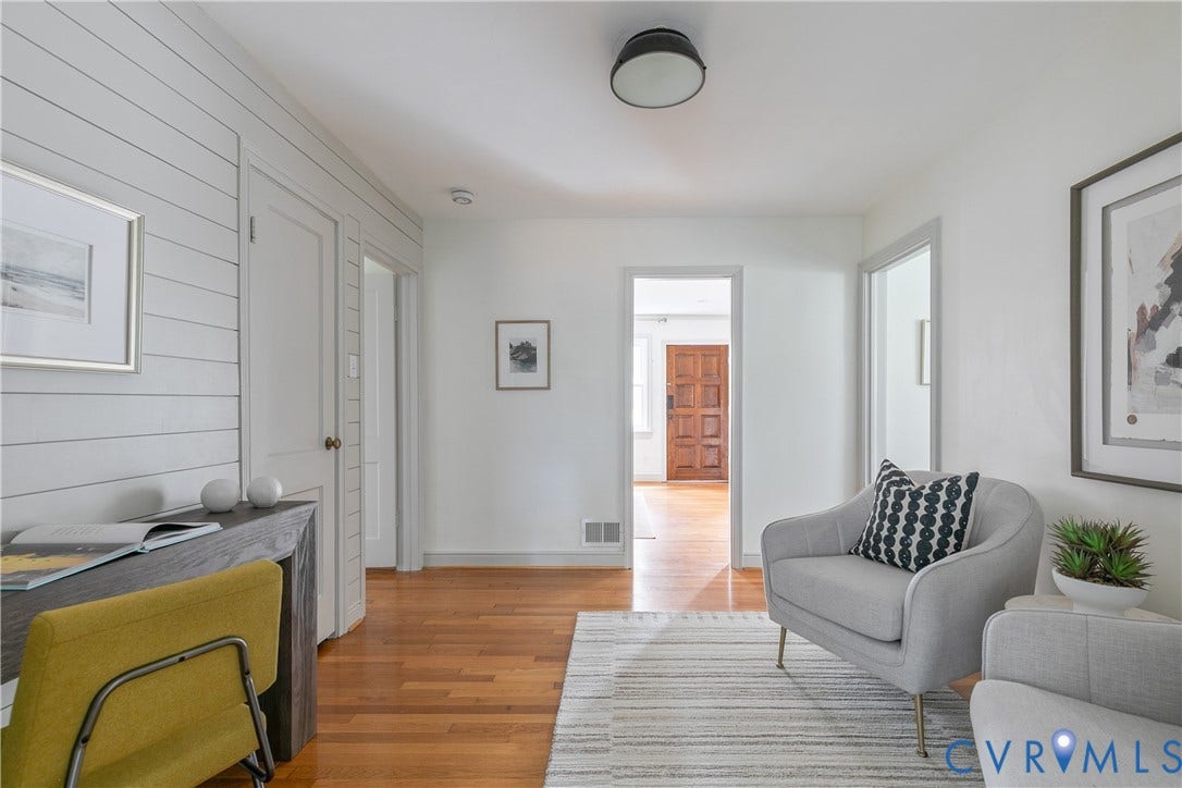4710 Park Avenue, Mary Munford / Near West End, Richmond, VA 23226 Interior space featuring horizontal shiplap wall paneling, wood-finish flooring, and a dome-style flush-mount ceiling light fixture