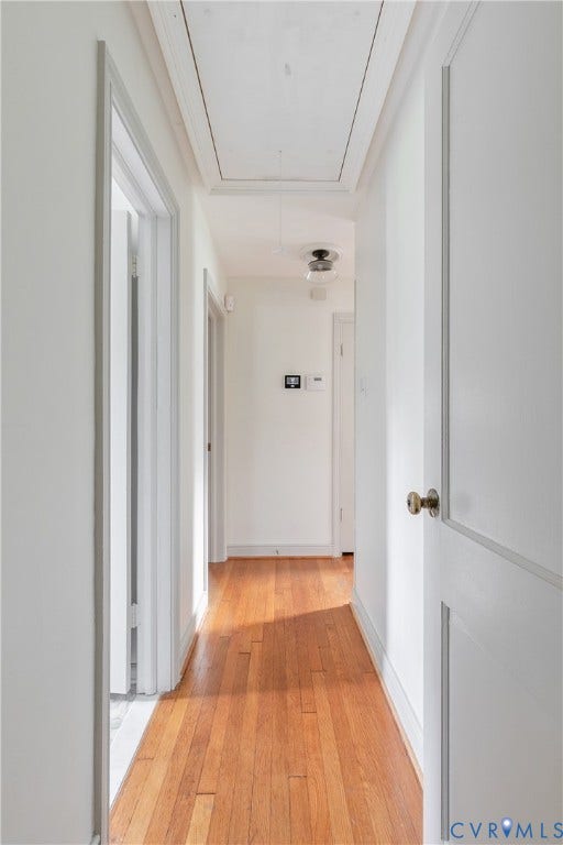 4710 Park Avenue, Mary Munford / Near West End, Richmond, VA 23226 Hallway featuring wood-finish flooring, two-panel interior doors with brass hardware, and flush-mount ceiling lighting