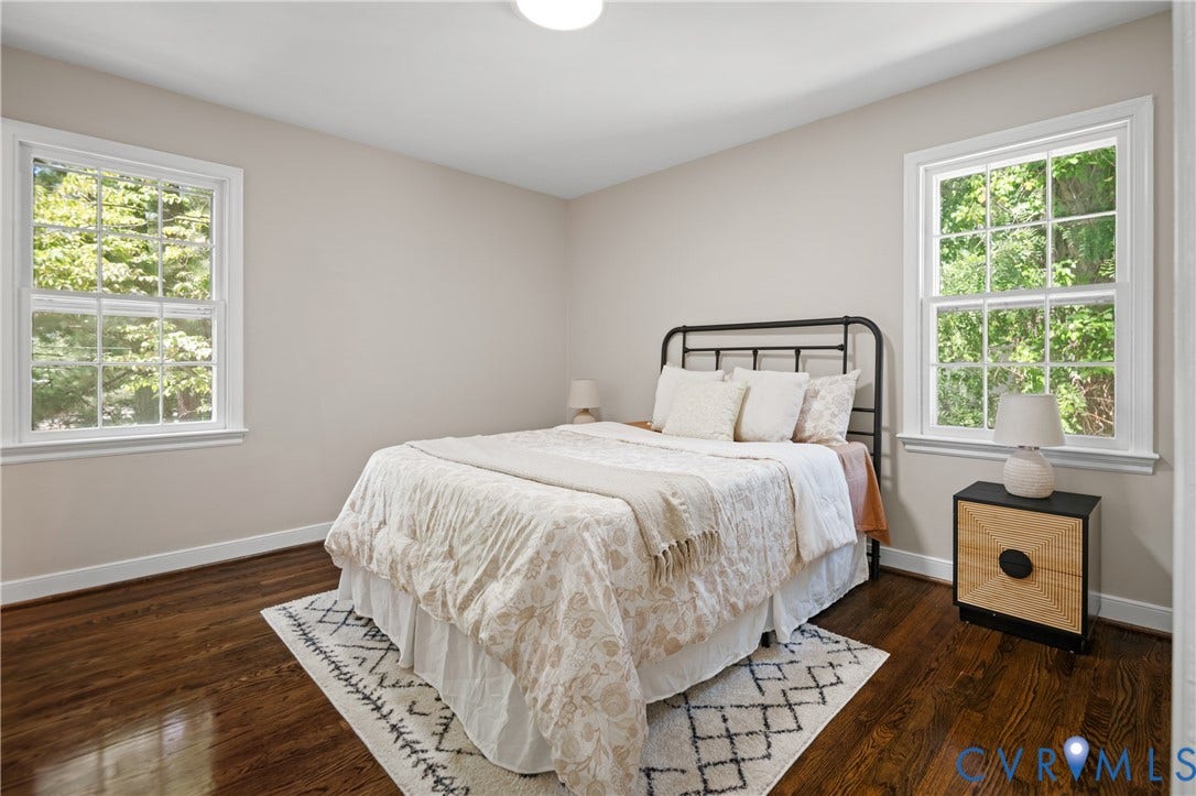 9010 Fawn Lane, Henrico, VA 23229 Hardwood flooring, neutral wall tones, and dual grid-pane windows providing natural light
