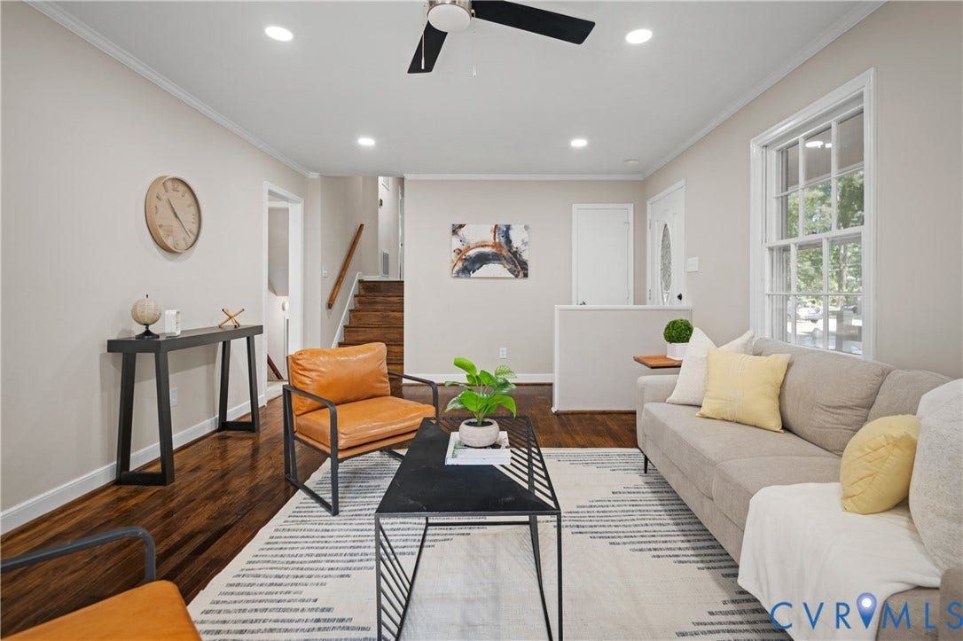 9010 Fawn Lane, Henrico, VA 23229 Interior space featuring dark wood-finish flooring, neutral wall paint, recessed lighting, a modern ceiling fan, and a staircase with a wooden handrail