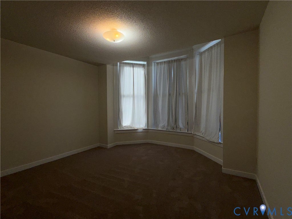 2030 Monument Avenue, #1, Richmond, VA 23220 Bay window faces the street and has blackout curtains