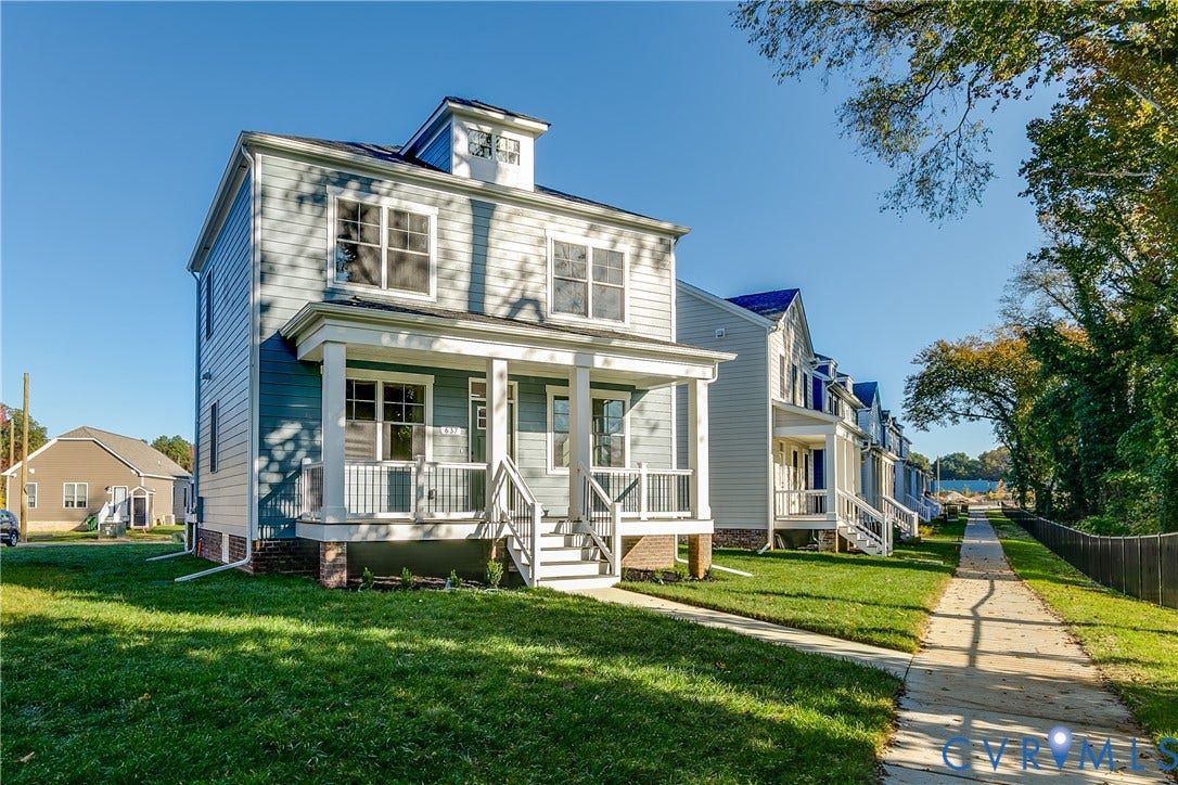 637 Ellens Haven Alley, Highland Grove, Richmond, VA 23222 Two-story residence featuring lap siding, a front porch with square columns and balustrades, a dormer window, and a brick foundation