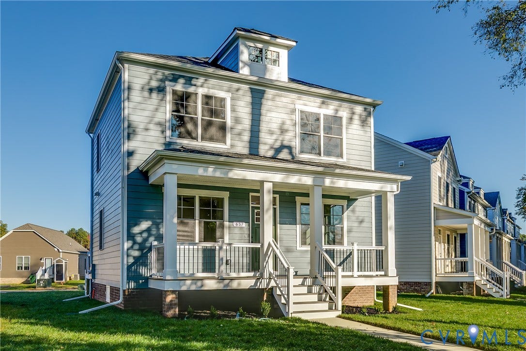 637 Ellens Haven Alley, Highland Grove, Richmond, VA 23222 Two-story exterior with horizontal siding, a covered front porch featuring square columns and metal railing, and a gabled dormer roofline
