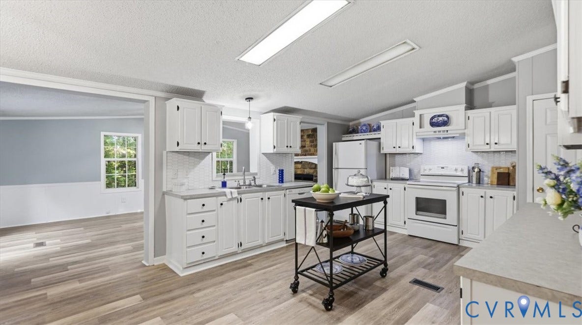 75 Claybank Road, Cumberland, VA 23040 Kitchen featuring white cabinetry, wood-finish flooring, tiled backsplash, and recessed overhead lighting