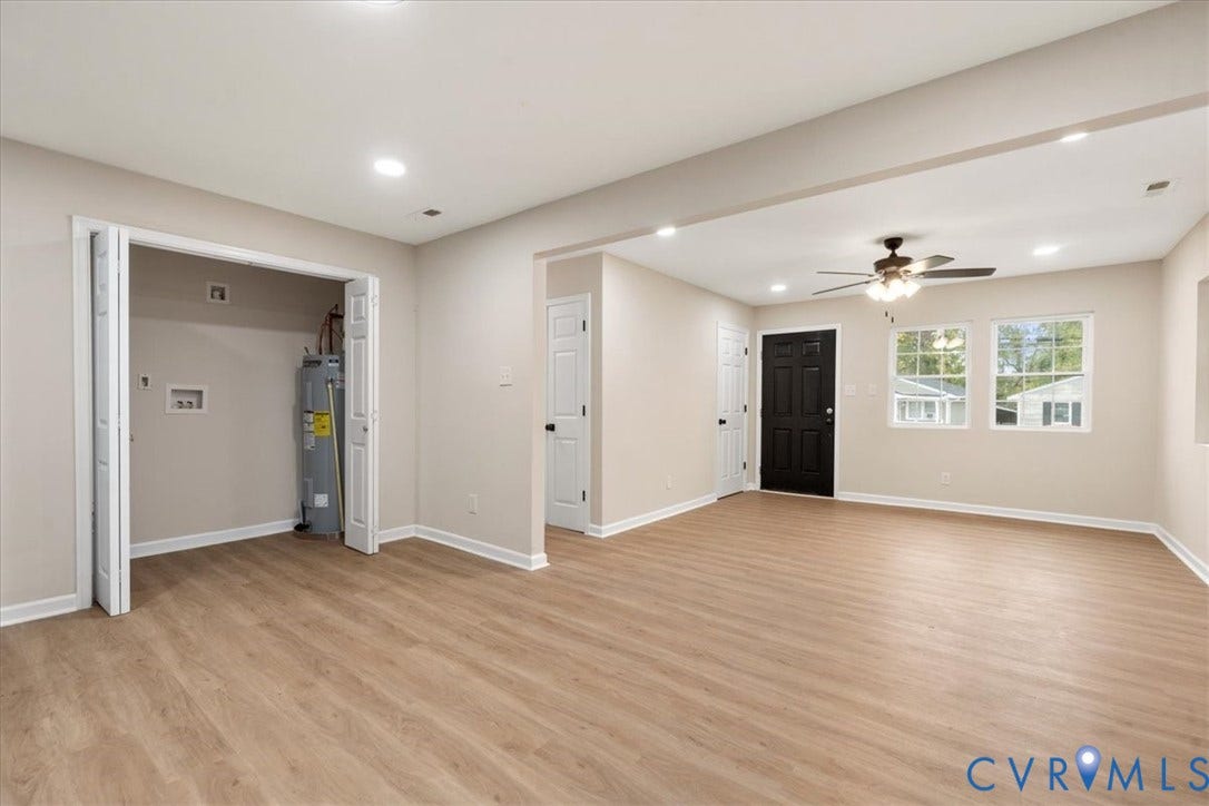 524 St Matthew Street, The Heights, Petersburg, VA 23803 Open-concept room featuring wood-finish flooring, recessed lighting, a ceiling fan with integrated lighting, and a utility closet with bifold doors