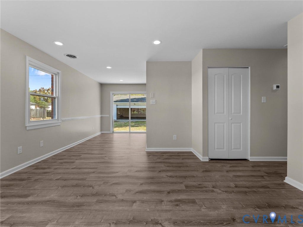 3303 Jowin Lane, Henrico, VA 23223 Interior space featuring wood-finish flooring, recessed lighting, double-panel closet doors, and sliding glass patio doors