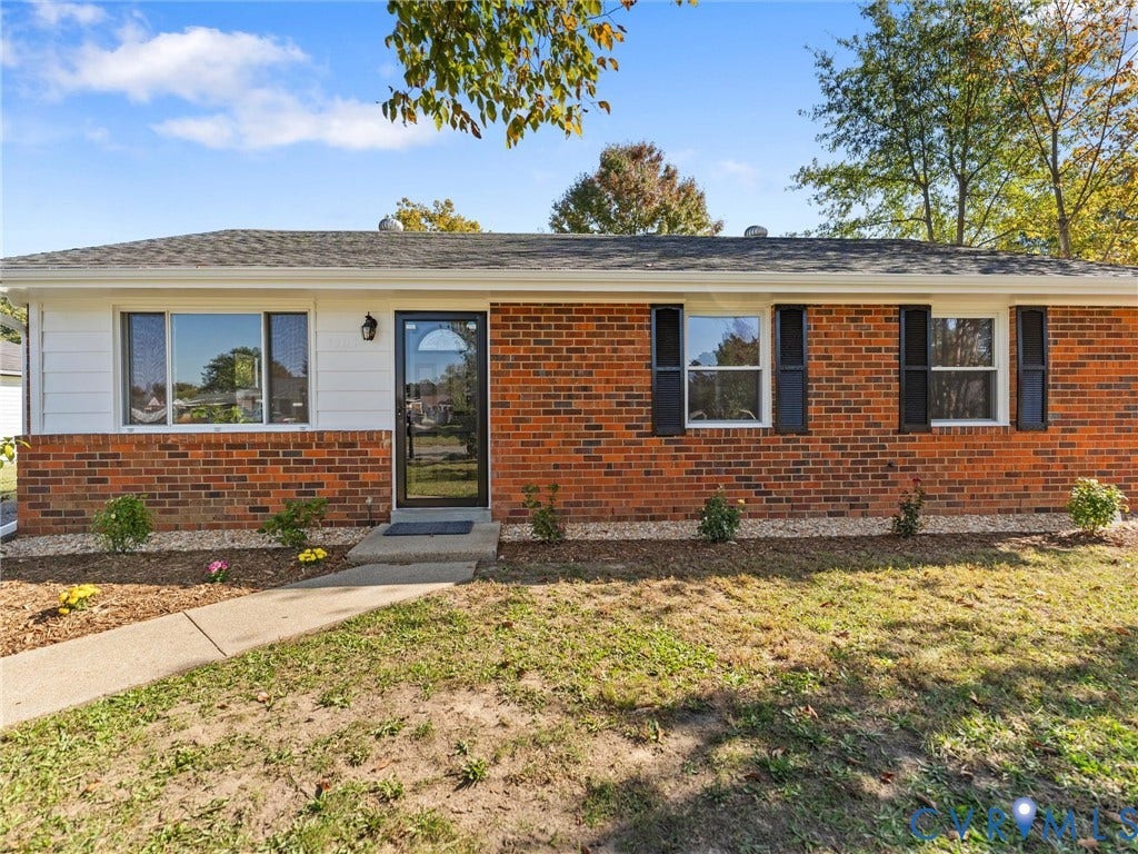 3303 Jowin Lane, Henrico, VA 23223 Single-story brick exterior featuring horizontal siding accents, dark shutters, a front entry with glass storm door, and a shingled roof