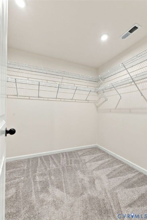7712 Hawthorne Avenue, Henrico, VA 23227 Walk-in storage space featuring neutral carpeting and tiered wire shelving