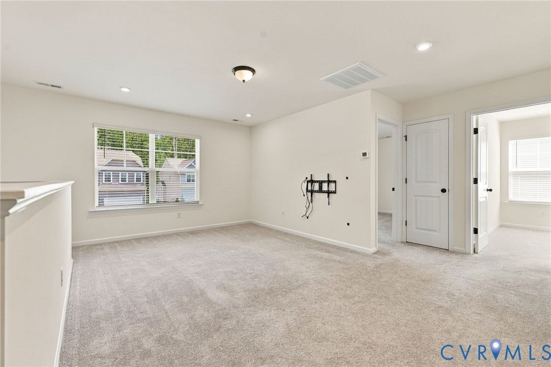 7712 Hawthorne Avenue, Henrico, VA 23227 Neutral-toned carpeting, recessed ceiling lighting, a flush-mount light fixture, and white interior doors with dark hardware