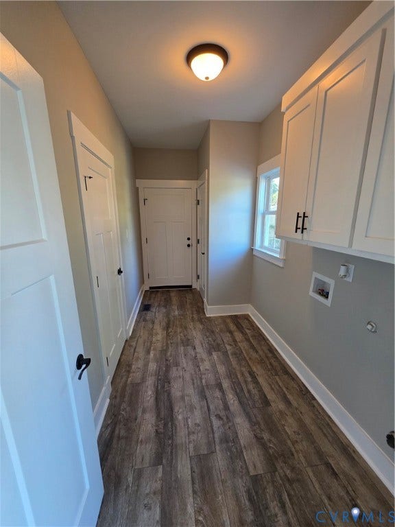 3005 Portsmouth Street, Hopewell, VA 23860 Utility area featuring wood-finish flooring, white shaker-style cabinetry with matte black hardware, and an overhead flush-mount light fixture
