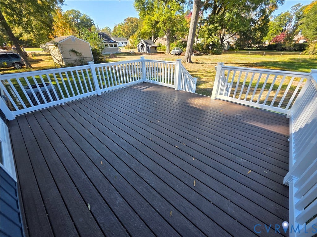 3005 Portsmouth Street, Hopewell, VA 23860 Elevated composite deck featuring white railings and staircase