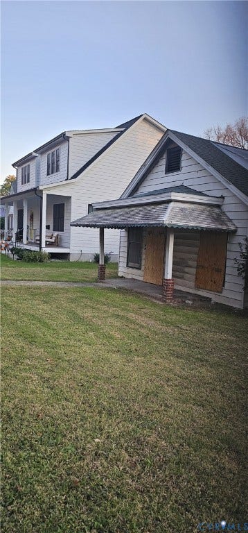 3601 Idlewood Avenue, Windsor Farms, Richmond, VA 23221 Exterior perspective featuring two-story and single-story structures with horizontal siding, a covered porch, brick column bases, and a pitched roofline