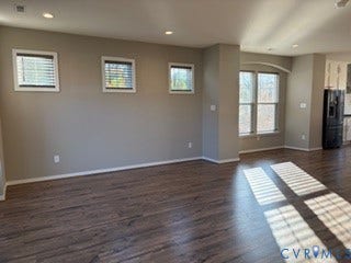 2144 Perennial Circle, Henrico, VA 23233 Wood-finish flooring, recessed lighting, and multiple windows featuring neutral wall tones and arched detailing