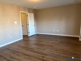 2144 Perennial Circle, Henrico, VA 23233 Room featuring wood-finish flooring, neutral-toned walls, and a five-panel interior door