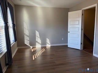 2144 Perennial Circle, Henrico, VA 23233 Room featuring wood-finish flooring, neutral wall paint, and a five-panel interior door