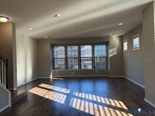 2144 Perennial Circle, Henrico, VA 23233 Open-concept space featuring wood-finish flooring, recessed lighting, and a prominent bank of multi-pane windows