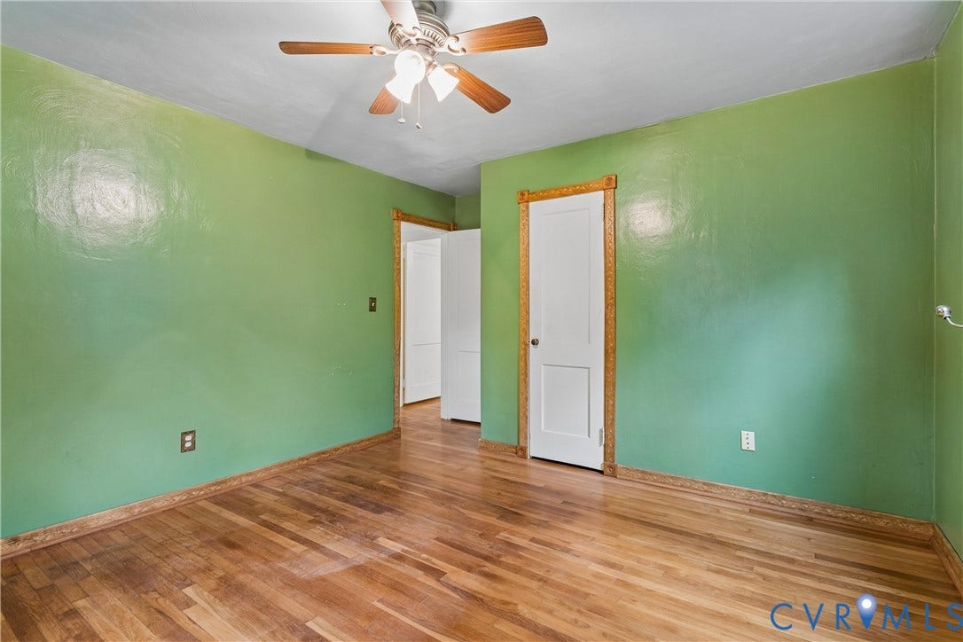 627 Sedgefield Drive, 992- All Others Area 107, Newport News, VA 23605 Wood-finish flooring, white paneled interior doors, decorative wood door casings, and a multi-blade ceiling fan with integrated lighting