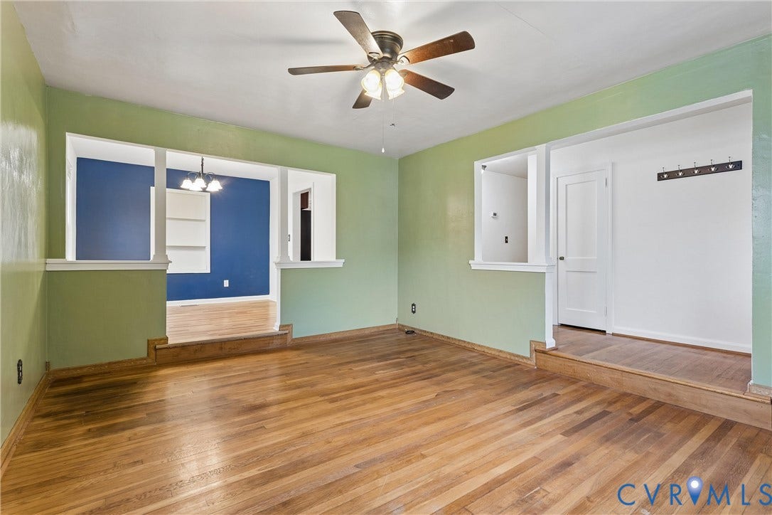 627 Sedgefield Drive, 992- All Others Area 107, Newport News, VA 23605 Wood-finish flooring, ceiling fan with integrated lighting, recessed wall shelving, and raised floor platforms