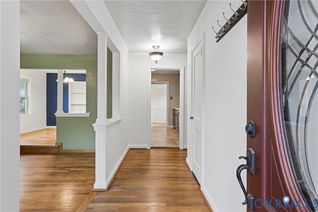 627 Sedgefield Drive, 992- All Others Area 107, Newport News, VA 23605 Entryway featuring wood-finish flooring, half-wall room divider with a decorative column, recessed lighting, and a multi-pane glass insert door with dark finish hardware