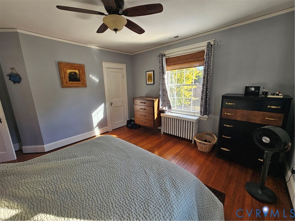 1206 Westminster Avenue, Richmond, VA 23227 Hardwood flooring, multi-pane window, ceiling fan with integrated lighting, and crown molding