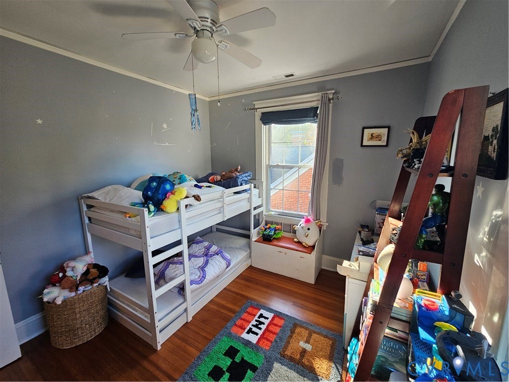 1206 Westminster Avenue, Richmond, VA 23227 Hardwood flooring, ceiling fan with integrated light fixture, and built-in window seat