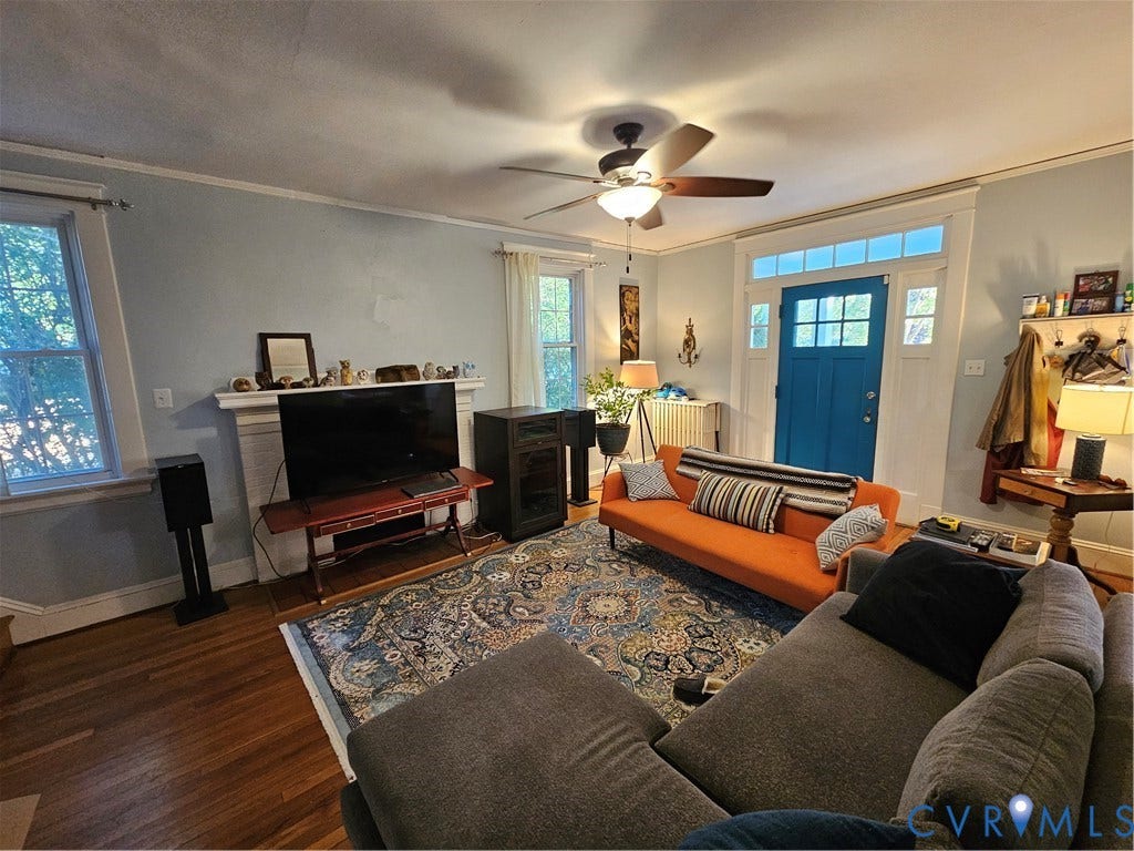1206 Westminster Avenue, Richmond, VA 23227 Hardwood flooring, wood-burning fireplace with mantel, ceiling fan, and entry door with transom window