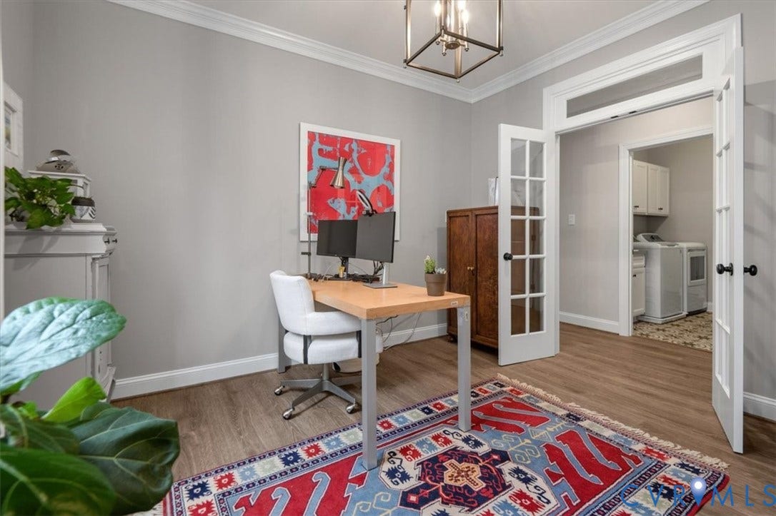 12168 Readers Pointe Drive, Readers Branch, Goochland, VA 23103 Room featuring wood-finish flooring, crown molding, a geometric metal-frame chandelier, and French doors with glass panes and transom windows