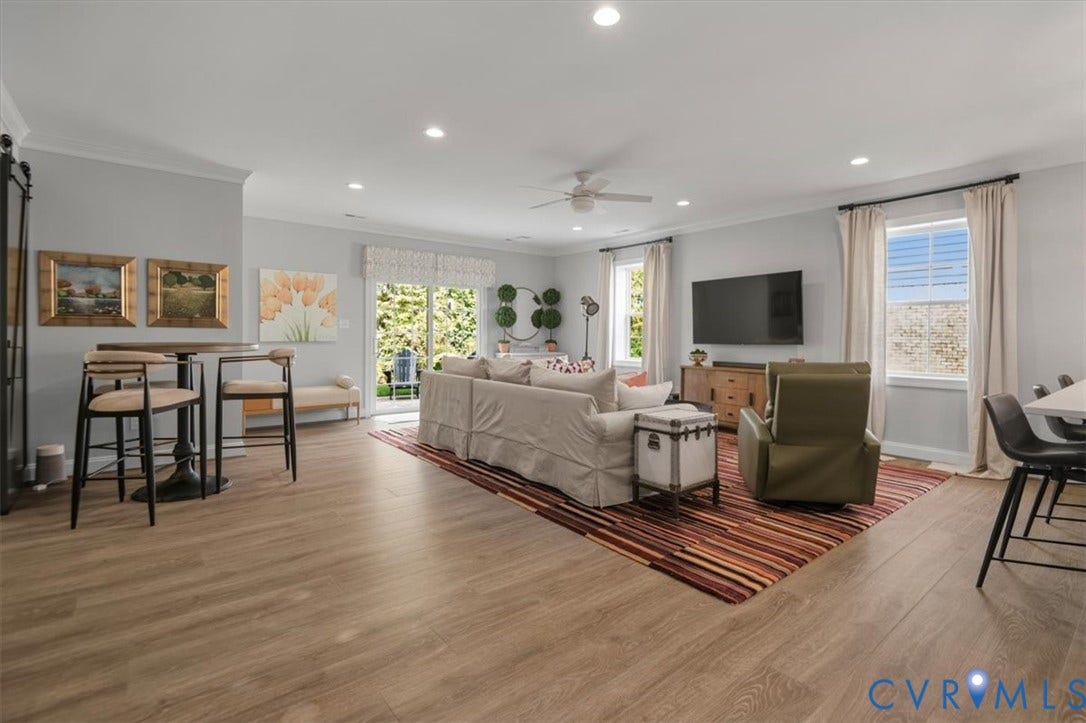 12168 Readers Pointe Drive, Readers Branch, Goochland, VA 23103 Terrace Level -Open-concept living space featuring wood-finish flooring, recessed lighting, a ceiling fan, and sliding glass doors