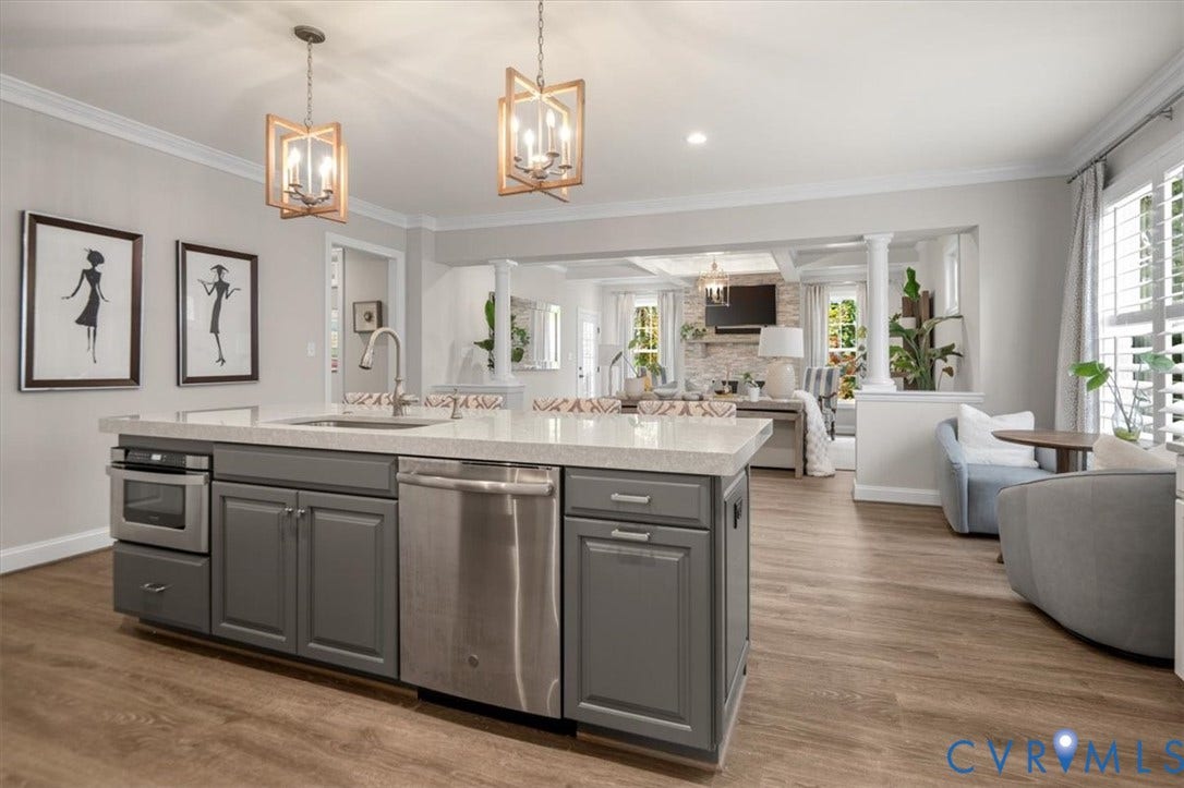 12168 Readers Pointe Drive, Readers Branch, Goochland, VA 23103 Kitchen island featuring grey cabinetry, stone-finish countertops, stainless steel appliances, and dual geometric pendant lighting over wood-finish flooring