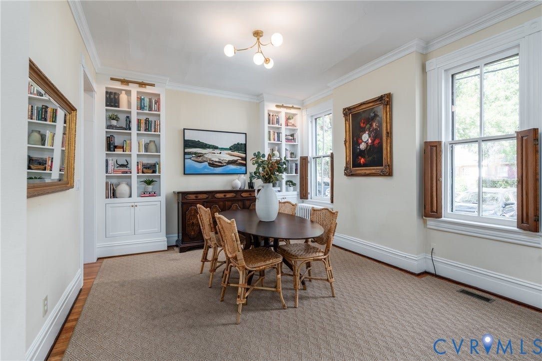 106 N Shields Avenue, The Fan, Richmond, VA 23220 Dining room with side windows and a new chandelier.