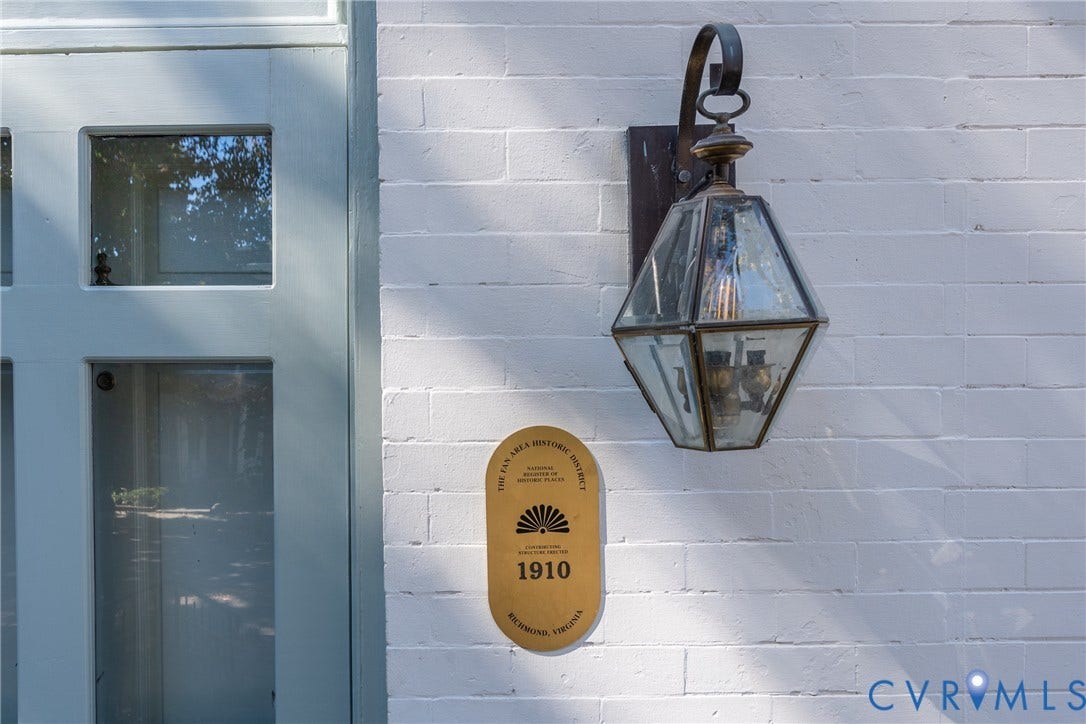106 N Shields Avenue, The Fan, Richmond, VA 23220 Plaque marking the house as a contributing structure in the Fan Area Historic District, erected 1910.