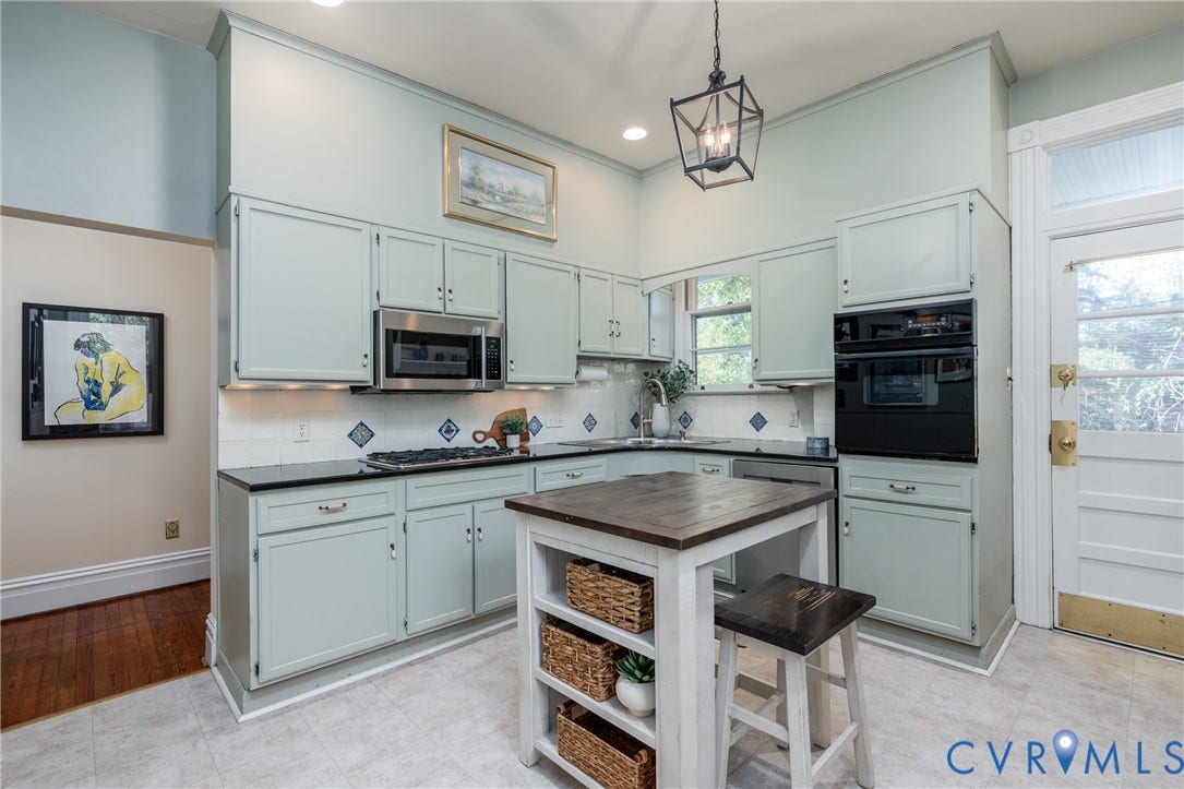 106 N Shields Avenue, The Fan, Richmond, VA 23220 Eat-in kitchen with painted cabinetry, a gas cooktop and a wall oven.