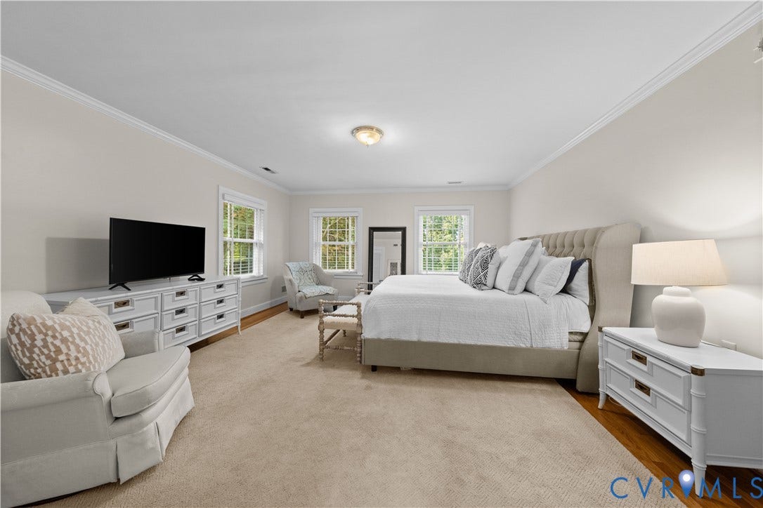 1203 Rothesay Circle, Windsor Farms, Richmond, VA 23221 Spacious room featuring neutral carpeting, crown molding, multi-pane windows, and a centrally positioned flush-mount light fixture