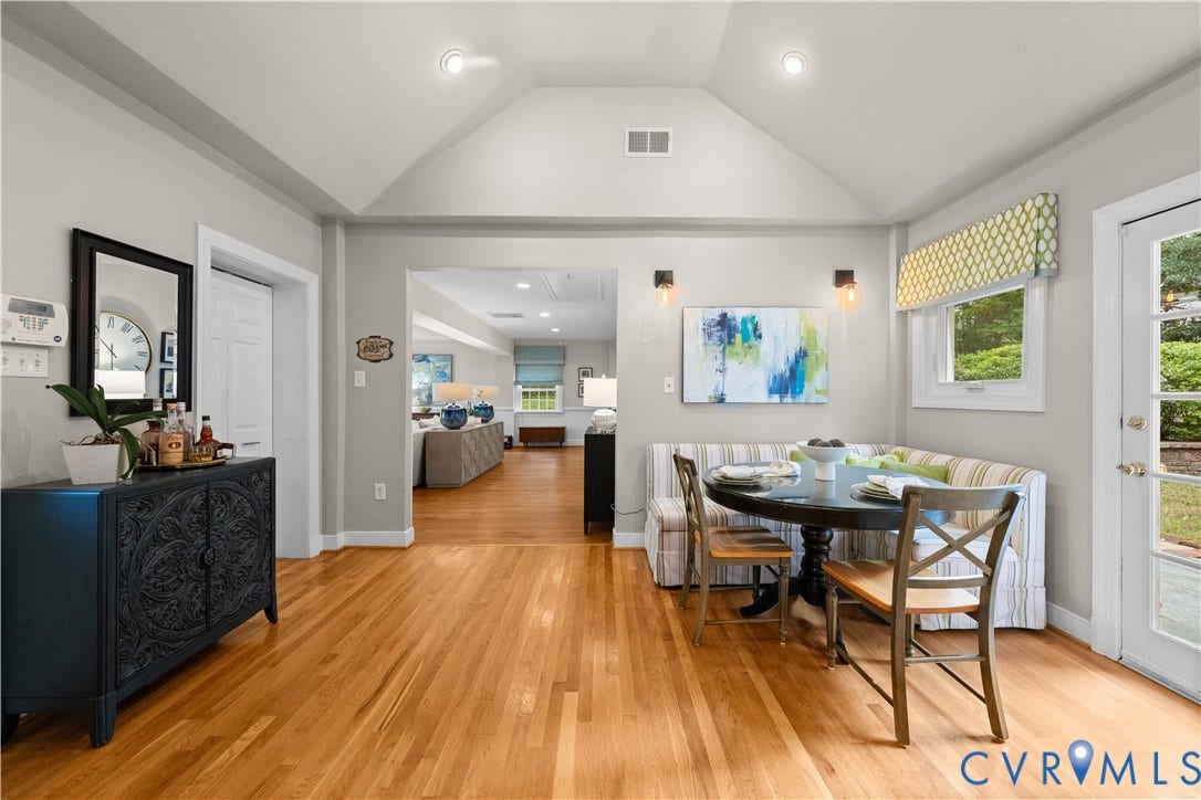 1203 Rothesay Circle, Windsor Farms, Richmond, VA 23221 Vaulted ceiling, wood-finish flooring, recessed lighting, wall-mounted light fixtures, and multi-lite glass panel door