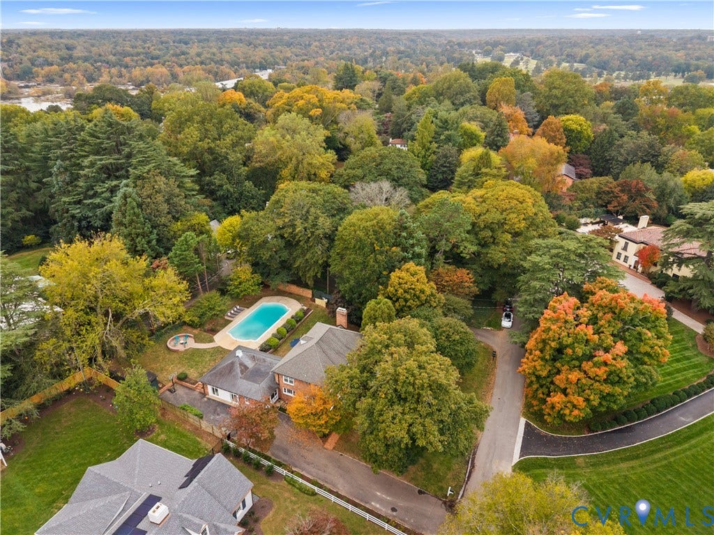 1203 Rothesay Circle, Windsor Farms, Richmond, VA 23221 Aerial perspective featuring a multi-level residence, an inground swimming pool with a circular spa, mature tree canopy, and expansive grass lawns