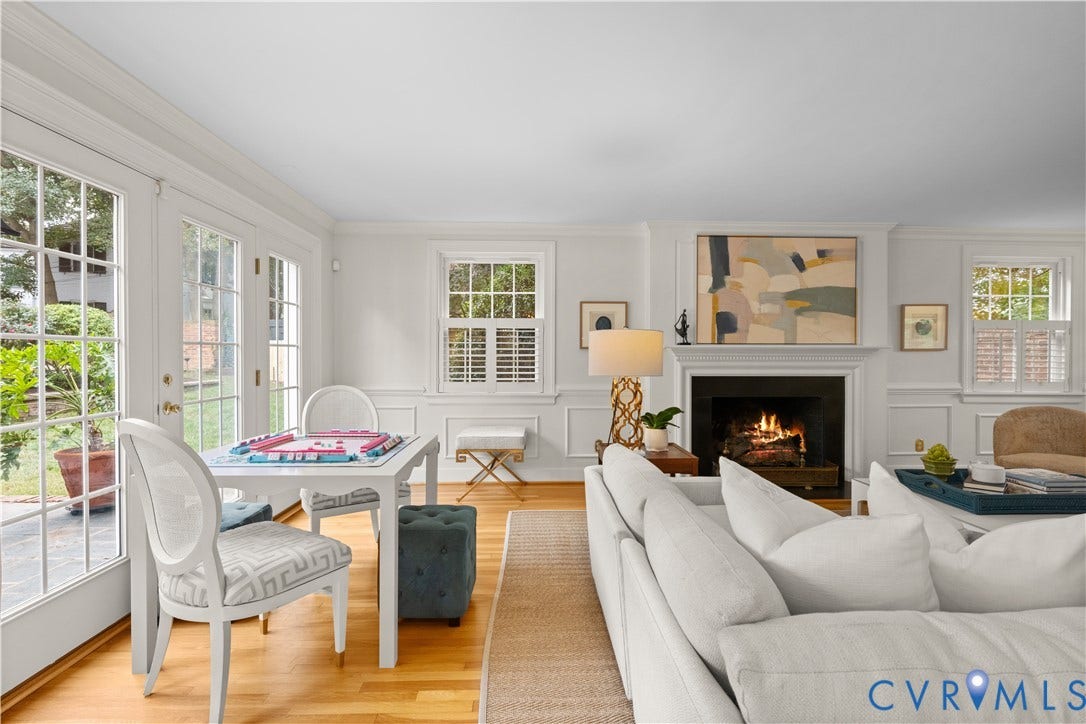 1203 Rothesay Circle, Windsor Farms, Richmond, VA 23221 Wood-finish flooring, fireplace with a decorative mantel, crown molding, wainscoting, and multi-pane glass doors