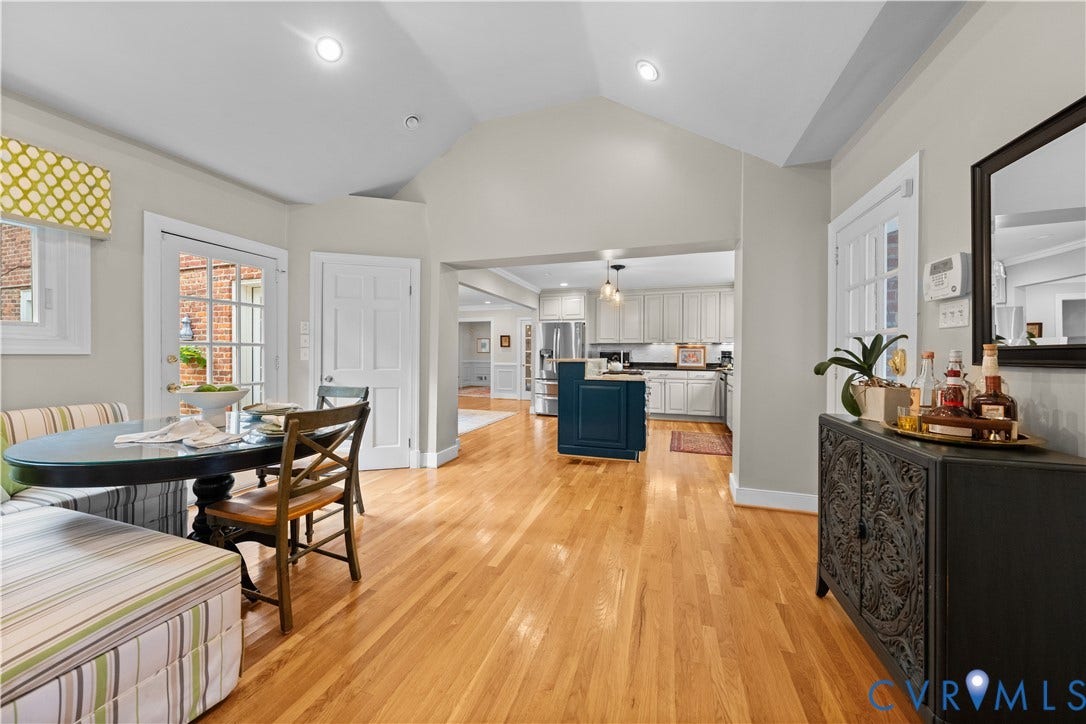 1203 Rothesay Circle, Windsor Farms, Richmond, VA 23221 Vaulted ceilings, wood-finish flooring, recessed lighting, glass-paneled exterior door, and kitchen with center island