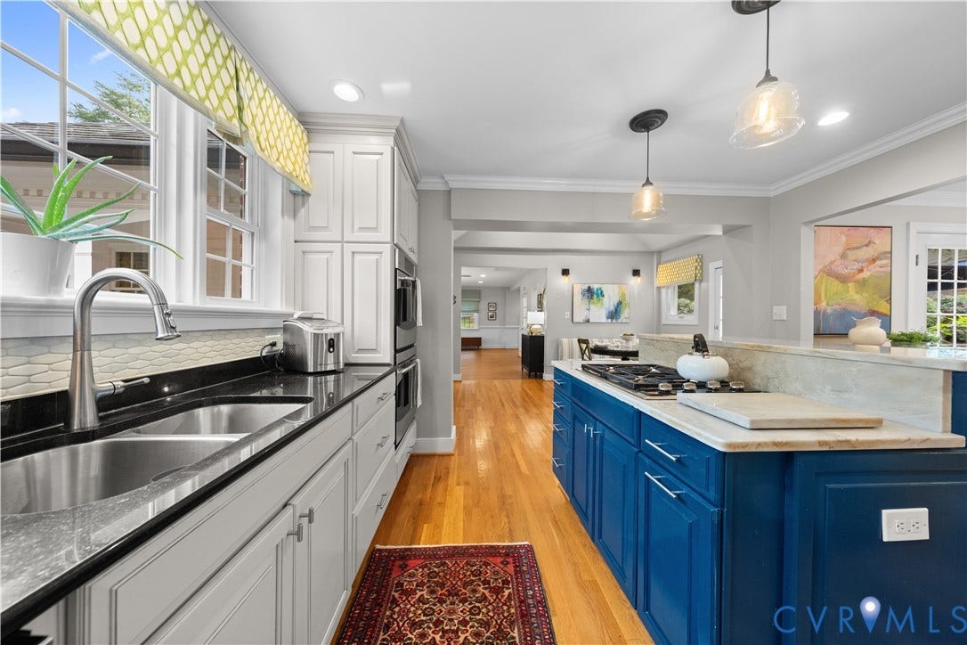 1203 Rothesay Circle, Windsor Farms, Richmond, VA 23221 Kitchen featuring white and deep blue cabinetry, stone countertops, stainless steel double-basin sink with arched faucet, built-in double wall oven, and wood-finish flooring