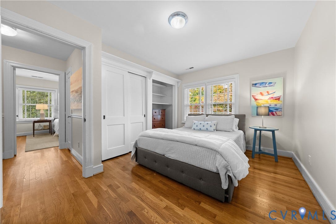 1203 Rothesay Circle, Windsor Farms, Richmond, VA 23221 Wood-finish flooring, white paneled closet doors, built-in recessed shelving, and multi-pane windows with trim casing