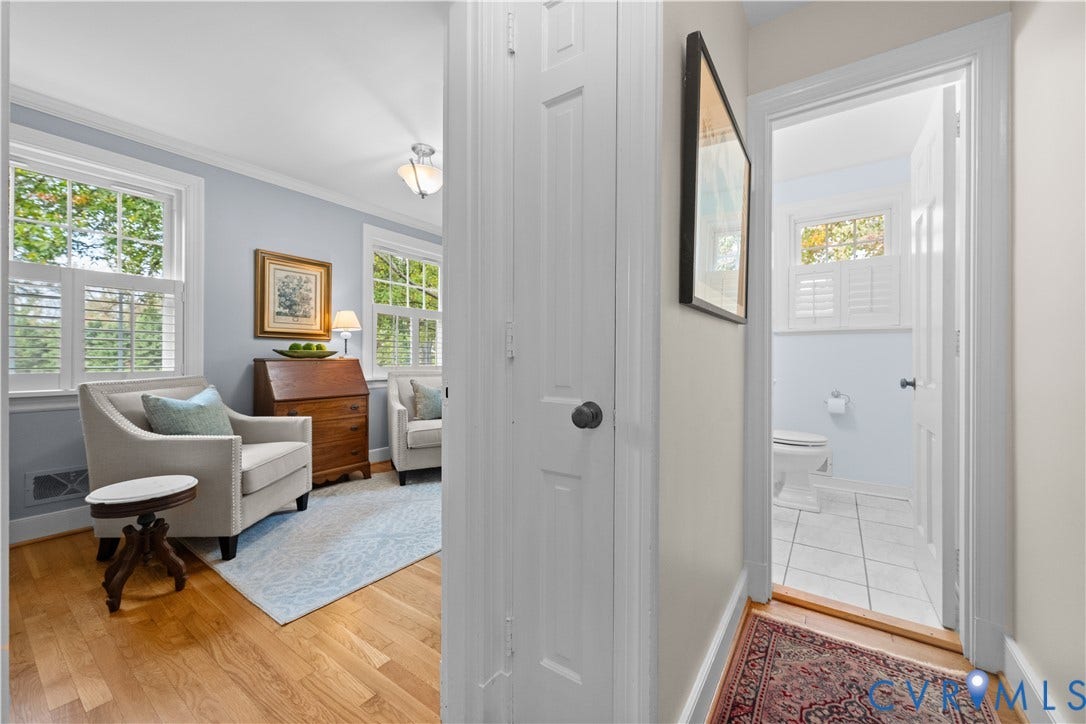 1203 Rothesay Circle, Windsor Farms, Richmond, VA 23221 Room featuring wood-finish flooring, multi-pane windows with integrated shutters, and crown molding, with entry to a tiled bathroom