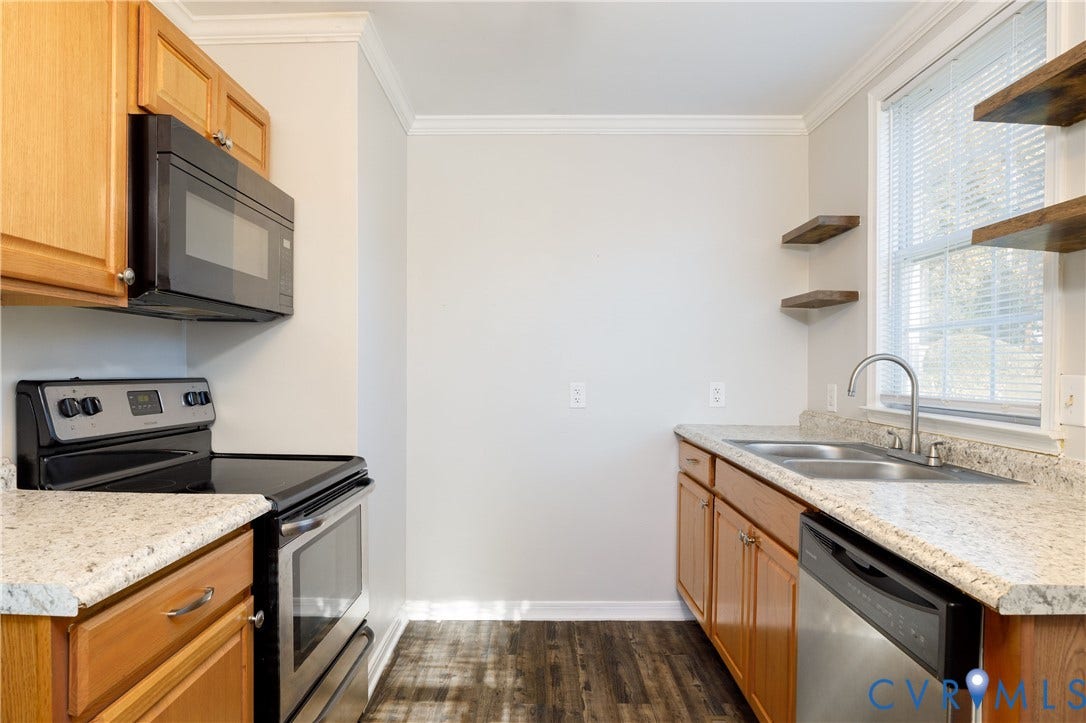 1010 E 17th Street, Oak Grove, Richmond, VA 23224 Kitchen featuring light-finish cabinetry, stone-texture countertops, wood-finish flooring, built-in stainless steel appliances, and wall-mounted shelving