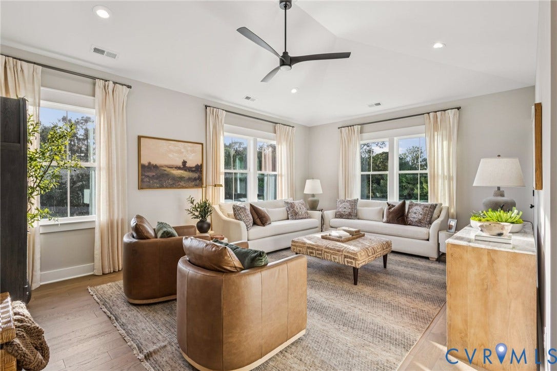 9275 Topeka Road, Quinton, VA 23141 Spacious living area featuring wood-finish flooring, recessed lighting, and a modern ceiling fan