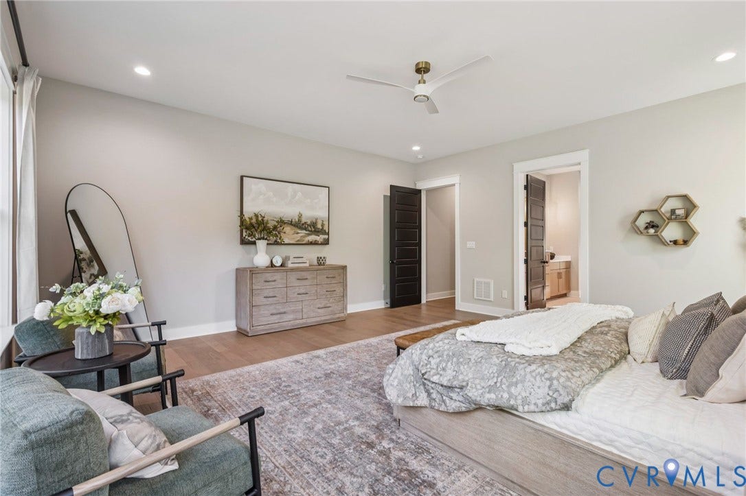 9275 Topeka Road, Quinton, VA 23141 Spacious room featuring wood-finish flooring, recessed lighting, and a contemporary ceiling fan