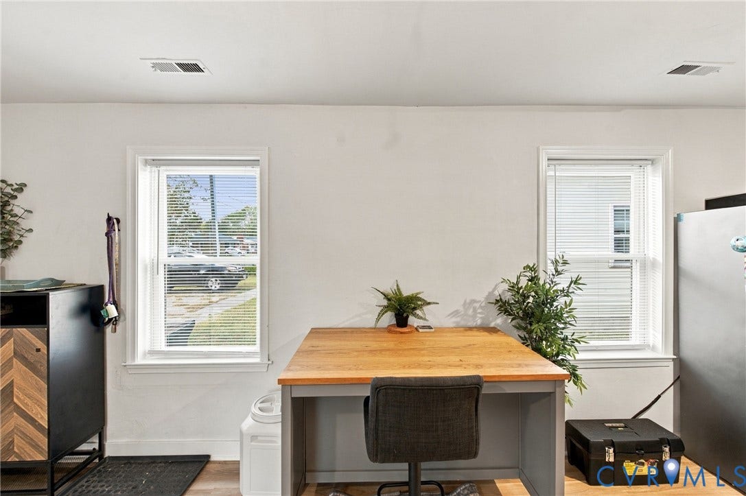 20 Victor Street, Geo Moss Estate, Hampton, VA 23669 Interior space featuring dual pane windows and wood-finish flooring