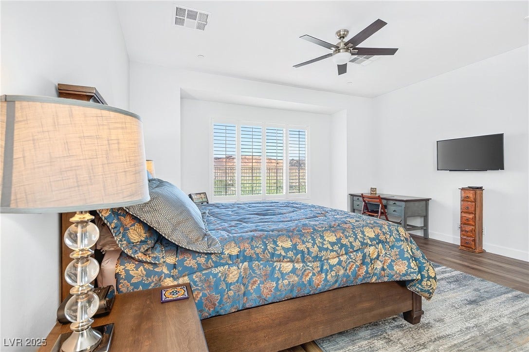 29 Porto Malaga Street, Henderson, NV 89011 A spacious primary suite designed for comfort and relaxation.